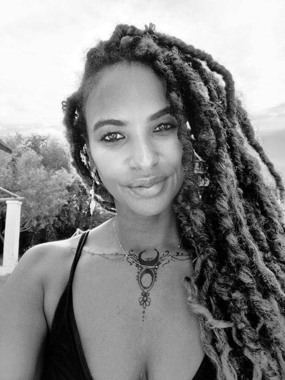 Title: Simone Clarke, The Lens of Love Alternate text: Simone Clarke, coach for people-pleasers and founder of The Lens of Love
